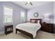 Bedroom with great natural light, two windows with blinds, and a ceiling fan at 7825 Green Hope School Rd, Cary, NC 27519