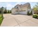 Spacious three car garage with an expansive driveway at 7825 Green Hope School Rd, Cary, NC 27519
