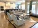 Bright and spacious living room with open floor plan and combined kitchen and dining areas at 7825 Green Hope School Rd, Cary, NC 27519