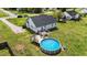 Aerial view of the backyard with deck and above ground pool and home at 82 Sommerset Dr, Clayton, NC 27520