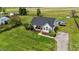 Charming home with well-manicured lawn and a refreshing above-ground pool, creating a serene outdoor retreat at 82 Sommerset Dr, Clayton, NC 27520