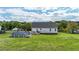 Enjoy the lush backyard with a refreshing above-ground pool and wooden deck, perfect for outdoor gatherings at 82 Sommerset Dr, Clayton, NC 27520