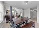 Cozy dining room with a view into the living room, flooded with natural light at 82 Sommerset Dr, Clayton, NC 27520