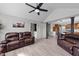 Bright living room with an open layout, connecting to the kitchen and dining area, perfect for entertaining at 82 Sommerset Dr, Clayton, NC 27520