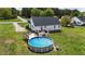 Relax by the above-ground pool and deck, perfect for outdoor entertaining and enjoying sunny days at 82 Sommerset Dr, Clayton, NC 27520