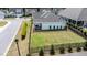 Aerial view of backyard featuring a fenced lawn and well-maintained landscaping in a serene neighborhood at 85 Bramble Ln, Clayton, NC 27527