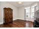 Bedroom featuring hardwood floors, natural light, and a wardrobe at 85 Bramble Ln, Clayton, NC 27527