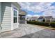 Outdoor patio with stamped concrete near a screened-in porch and neighboring homes at 85 Bramble Ln, Clayton, NC 27527
