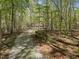 Long driveway and mature trees provide lots of privacy to this lovely home at 922 Royal Oaks Dr, Durham, NC 27712