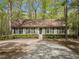 Charming single-story home featuring a well-maintained lawn, symmetrical design, and inviting entrance at 922 Royal Oaks Dr, Durham, NC 27712