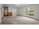 Open-concept living room with natural light and access to multiple rooms, providing a flexible layout at 922 Royal Oaks Dr, Durham, NC 27712
