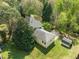 An aerial view of the property, showcasing the house, garage, shed, and backyard at 104 Glenview Pl, Chapel Hill, NC 27514