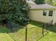 A fenced backyard with well-maintained grass and mature trees at 104 Glenview Pl, Chapel Hill, NC 27514