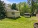 A view of the backyard, garage, and shed at 104 Glenview Pl, Chapel Hill, NC 27514