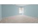 Bedroom with neutral carpet and a corner window at 104 Glenview Pl, Chapel Hill, NC 27514