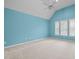 Spacious bedroom with vaulted ceilings and multiple windows at 104 Glenview Pl, Chapel Hill, NC 27514