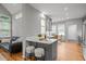 Kitchen with breakfast bar seating and open layout to a living space at 104 Glenview Pl, Chapel Hill, NC 27514