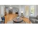 Spacious open living area showcasing hardwood floors and seamlessly flowing into other living spaces at 104 Glenview Pl, Chapel Hill, NC 27514