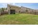 A well maintained lawn makes up this ample backyard with a screened porch and wooden fence at 108 Pronghorn Deer Ct, Garner, NC 27529