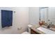 This bathroom includes a granite countertop vanity, toilet, towel rack, and neutral wall color at 108 Pronghorn Deer Ct, Garner, NC 27529