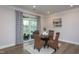 Cozy breakfast nook with glass table and patio access, perfect for casual dining and outdoor entertaining at 108 Pronghorn Deer Ct, Garner, NC 27529