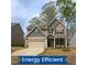 Charming two-story home featuring a well-maintained lawn and solar panels for energy efficiency at 108 Pronghorn Deer Ct, Garner, NC 27529