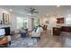 Spacious living room with fireplace, hardwood floors, and an open layout perfect for entertaining at 108 Pronghorn Deer Ct, Garner, NC 27529