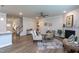 Inviting open-concept living space featuring hardwood floors, a fireplace, and seamless flow throughout at 108 Pronghorn Deer Ct, Garner, NC 27529