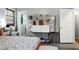 Bedroom featuring floating shelves, storage, and a closet with modern climate control at 1105 Terrace Ct, Raleigh, NC 27615