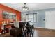 Bright dining area with bar seating, modern chandelier, and an open, airy feel at 1105 Terrace Ct, Raleigh, NC 27615