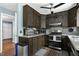 Well-equipped kitchen with granite countertops, stainless steel appliances, and ample storage space at 1105 Terrace Ct, Raleigh, NC 27615