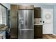 Bright kitchen with stainless steel refrigerator and ample cabinet space at 1105 Terrace Ct, Raleigh, NC 27615