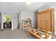 Open landing area with storage, desk and workspace area adjacent to the bedroom at 119 Weaver Mine Trl, Chapel Hill, NC 27517