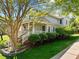 Charming two-story home featuring a covered front porch and beautifully landscaped front yard at 119 Weaver Mine Trl, Chapel Hill, NC 27517