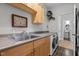 Laundry room with sink, cabinets and appliances at 119 Weaver Mine Trl, Chapel Hill, NC 27517