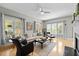 Comfortable living room with modern furniture, large windows, and stylish decor at 119 Weaver Mine Trl, Chapel Hill, NC 27517