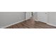 Basement featuring hardwood floors and a doorway at 120 Cabrita Ct, Holly Springs, NC 27540