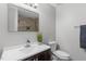 Bathroom featuring a vanity with silver faucet, and tile shower at 120 Cabrita Ct, Holly Springs, NC 27540