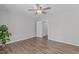 Large bedroom with ceiling fan, closet, and hardwood flooring at 120 Cabrita Ct, Holly Springs, NC 27540
