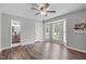 Spacious main bedroom features bay window, ceiling fan, and ensuite bathroom at 120 Cabrita Ct, Holly Springs, NC 27540