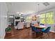 Spacious living space combining dining, living, and kitchen areas with hardwood floors at 1211 Yellow Wood Dr, Mebane, NC 27302