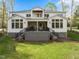 Spacious backyard with a large deck, perfect for outdoor entertaining and relaxation at 1213 Rocky Point Ln, Durham, NC 27712