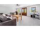 Spacious bonus room with plush carpeting, a drum set, and multiple workspaces at 1213 Rocky Point Ln, Durham, NC 27712