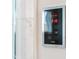 Close-up of the digital control panel inside of the walk-in shower at 1213 Rocky Point Ln, Durham, NC 27712