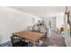 Bright dining area connected to the kitchen, featuring modern seating and ample space for Gathering meals and gatherings at 128 Holmes Corner Dr, Smithfield, NC 27577