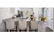 Modern kitchen featuring granite counters, stainless steel appliances, breakfast bar, and view to dining at 128 Holmes Corner Dr, Smithfield, NC 27577