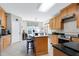 Beautiful kitchen featuring granite countertops, stainless steel appliances and tiled flooring at 1310 Country Club Dr, Durham, NC 27712