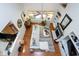 Bright, airy living room with hardwood floors and tall windows at 1310 Country Club Dr, Durham, NC 27712