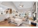 Spacious living room with vaulted ceiling and large windows allowing natural light at 1310 Country Club Dr, Durham, NC 27712