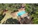 Aerial view of a private backyard oasis with pool, lounge chairs, and shaded gazebo at 132 Wheatsbury Dr, Cary, NC 27513
